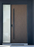 Matt black 1500mm entry door pull handle set on a dark background, featuring a slatted timber door 
