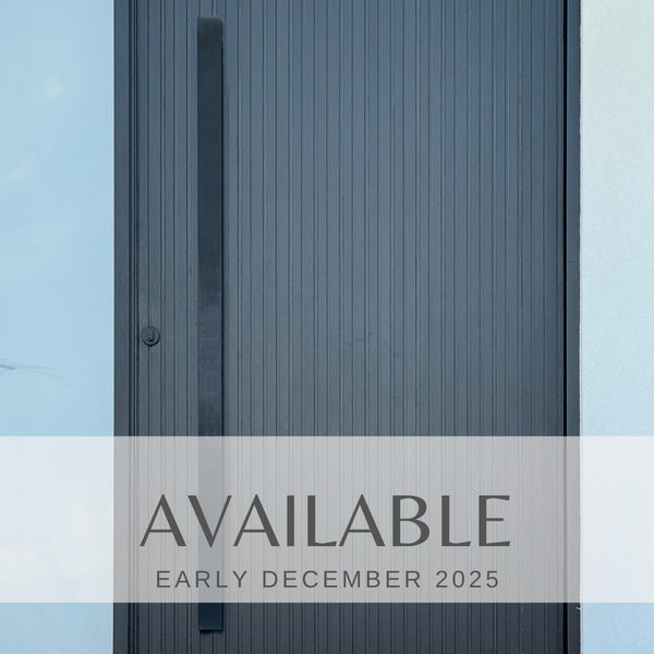 Matt black entry door pull handle set with a 50mm front view install on a modern black timber door