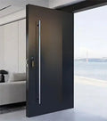 1800mm stainless steel entry door pull handle with a Gunmetal finish, installed on a  modern black door