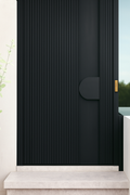 Modern black door with ribbed texture and Black D-plate pull handle