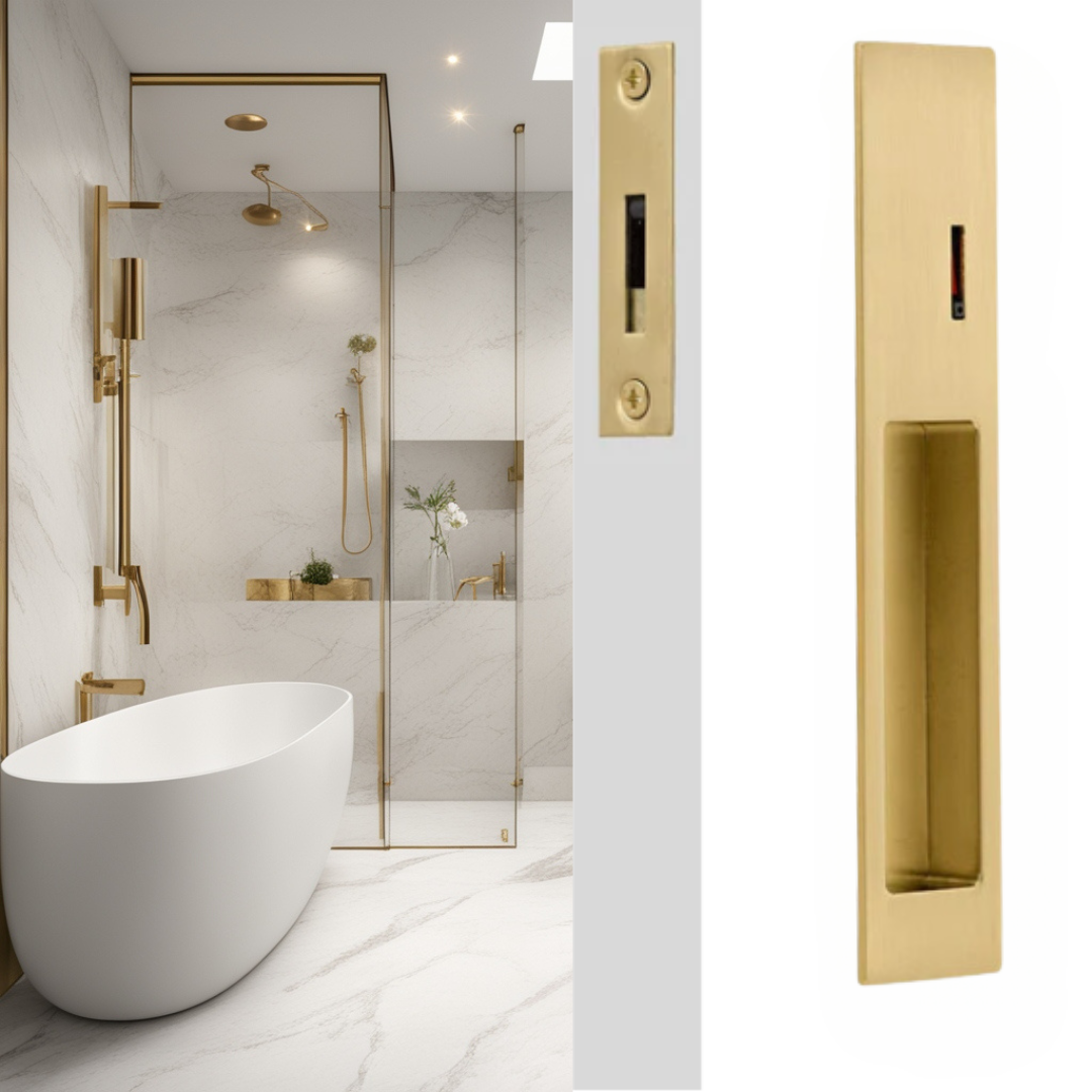 Brushed brass sliding privacy lockset with a rectangular privacy plate and built-in flush pull, installed on a sliding door in a bathroom setting.